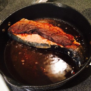 Skin crisp, starting to pull away from the fish